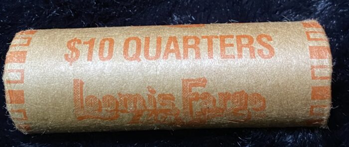 Roll of $10 quarters currency