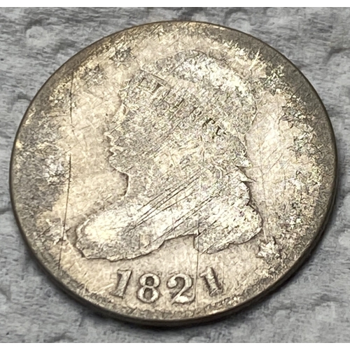 1821 vintage coin with worn features