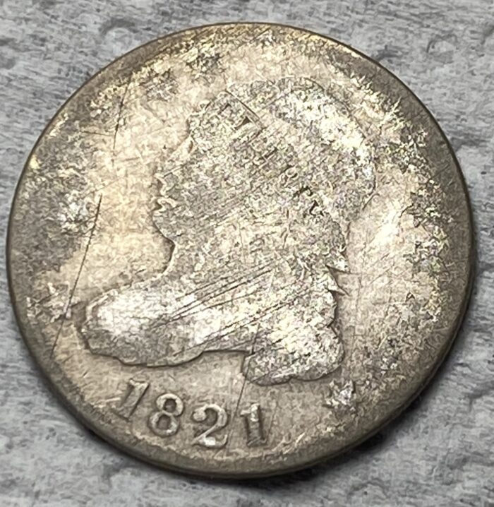 1821 vintage silver coin with worn details