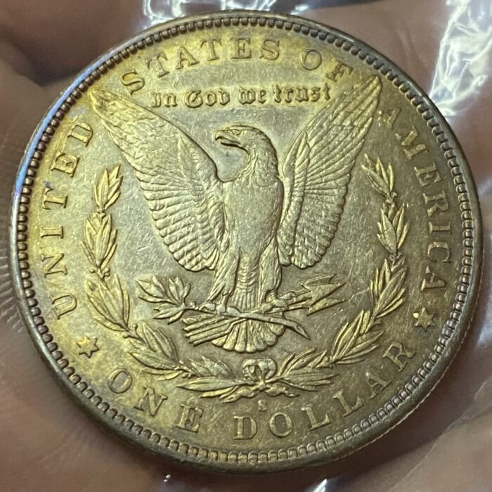 Vintage U.S. silver dollar coin with eagle design.