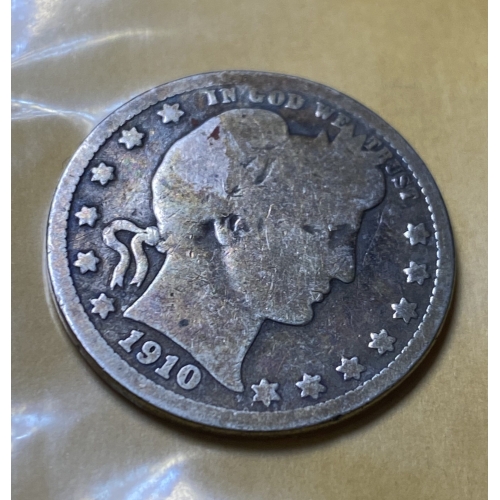 1910 silver coin with profile portrait design.