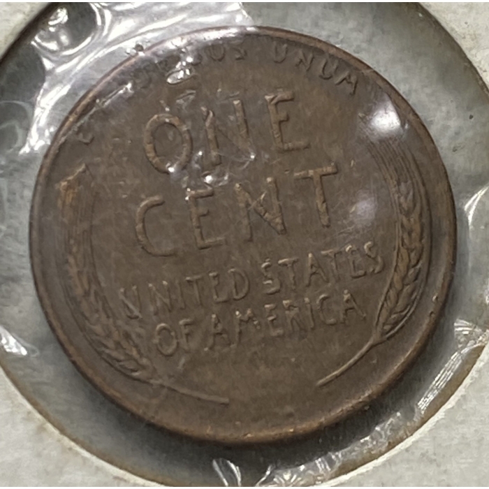 Close-up of a vintage one-cent coin