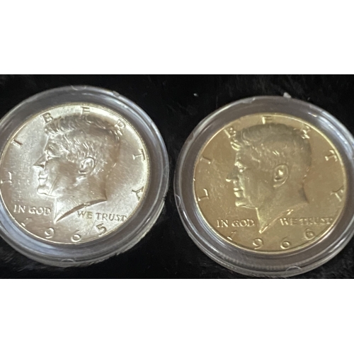 Two Kennedy half dollar coins, 1965 and 1966.