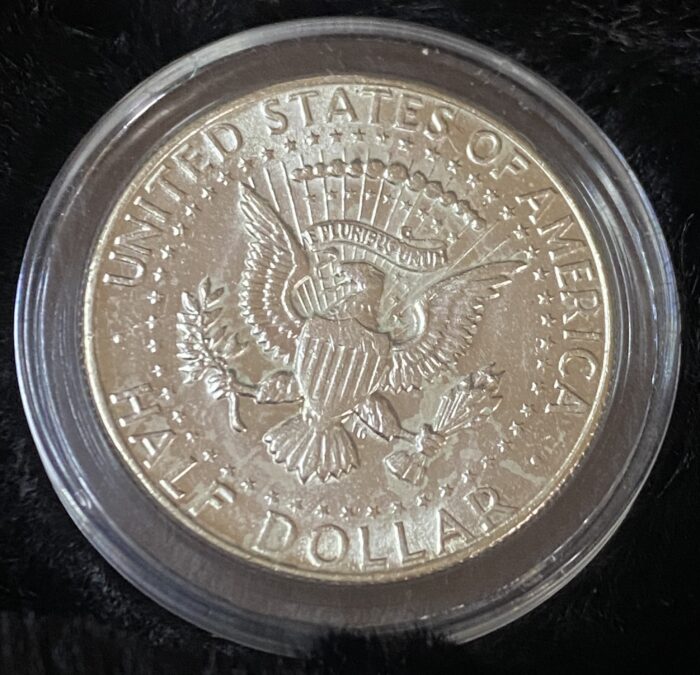 Reverse of U.S. half dollar coin with eagle.