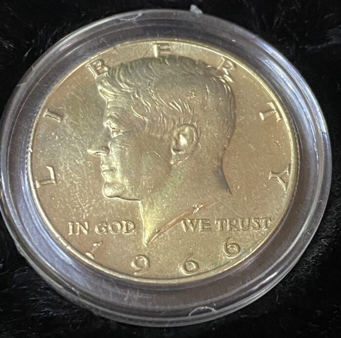 1966 Kennedy half dollar coin in case