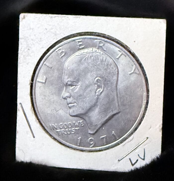 1971 Eisenhower dollar coin in holder