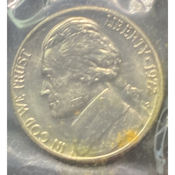Close-up of a 1912 Liberty nickel coin.