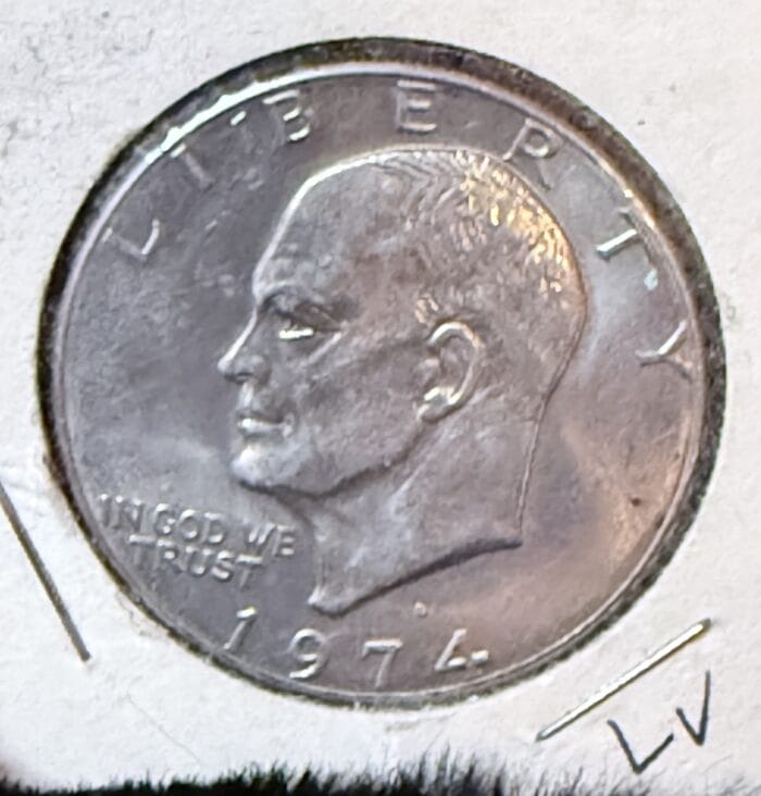 1974 Eisenhower silver dollar coin with profile image.