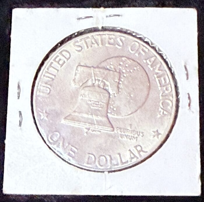 United States Liberty Bell silver dollar coin.