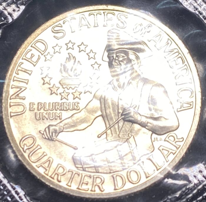 United States commemorative quarter with drumming image.