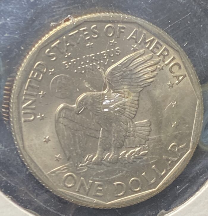 1980 USA one dollar coin with eagle design.