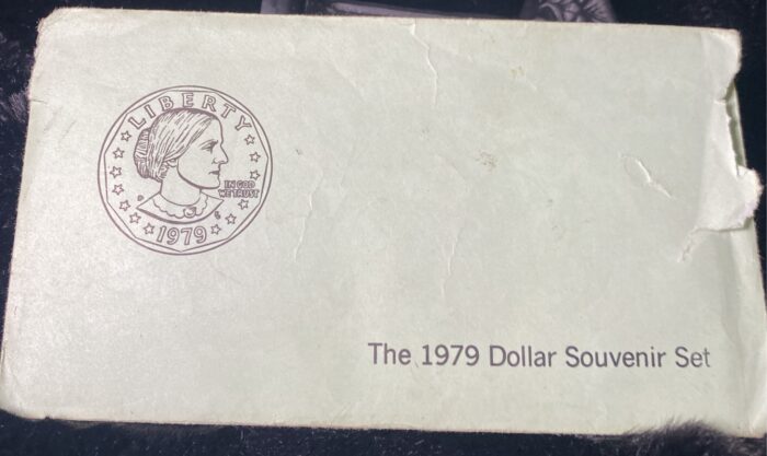 1979 Dollar Souvenir Set packaging with coin design.