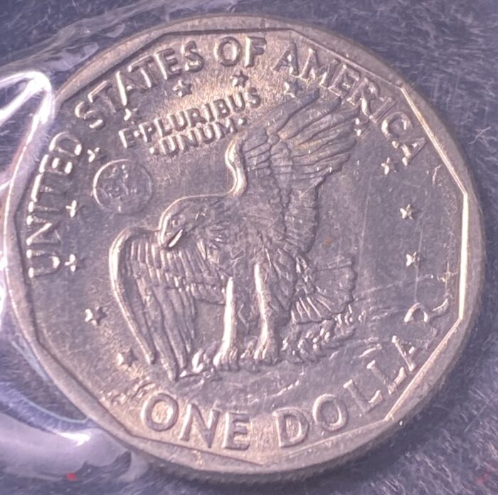 United States one dollar coin, eagle design.