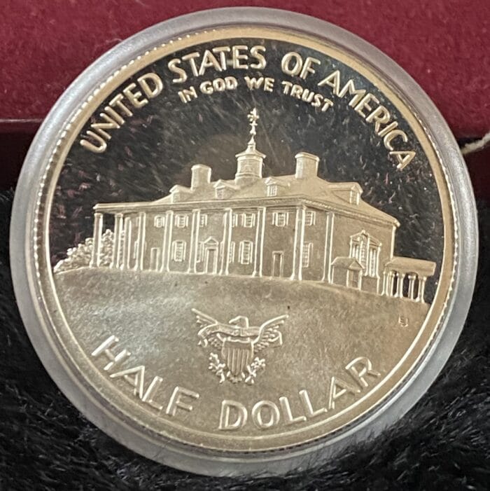 United States half dollar coin displaying a building.