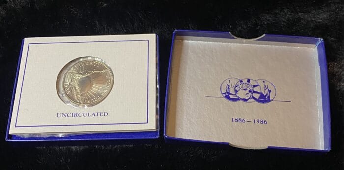 1886-1986 uncirculated coin in display box