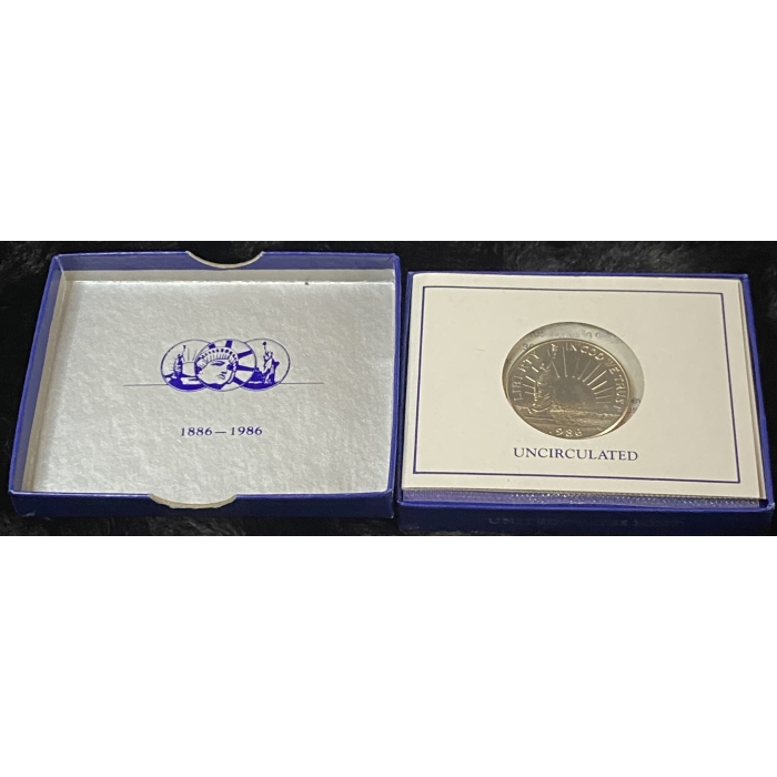 1886-1986 uncirculated commemorative coin in box