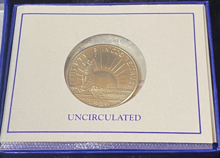 1986 uncirculated commemorative coin in case