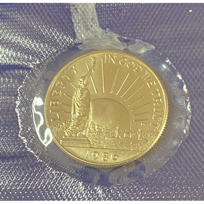 1986 gold coin with Statue of Liberty engraving