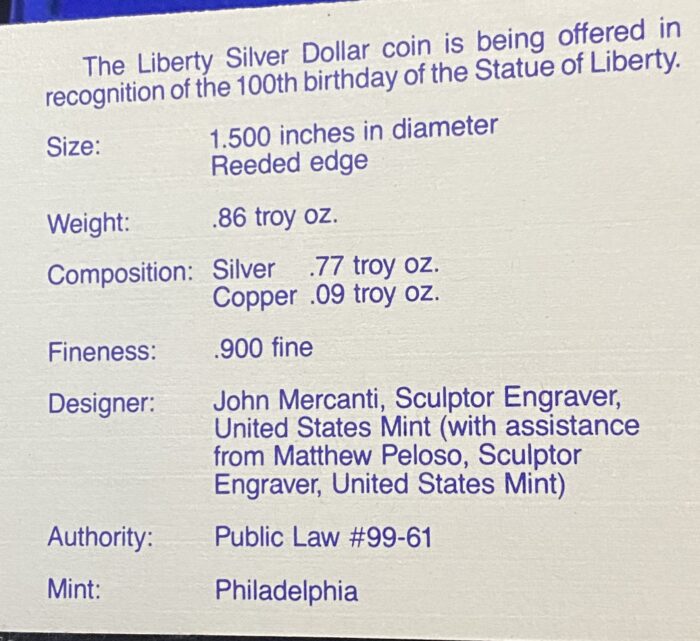 Liberty Silver Dollar coin specifications and designer details.