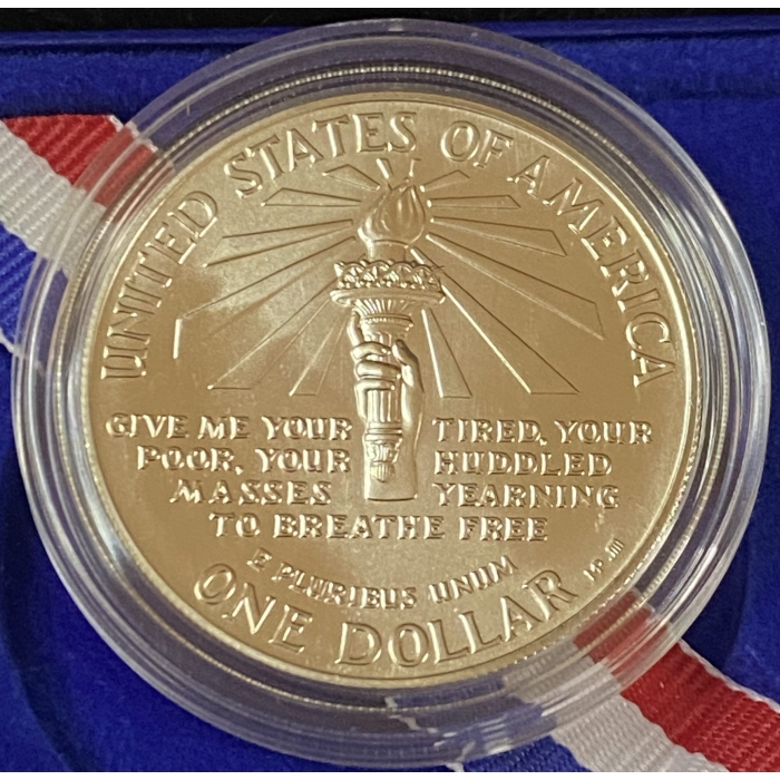 Reverse of 1986 Statue of Liberty commemorative dollar coin.