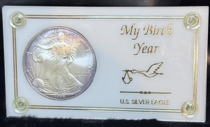 1996 U.S. Silver Eagle coin in display.