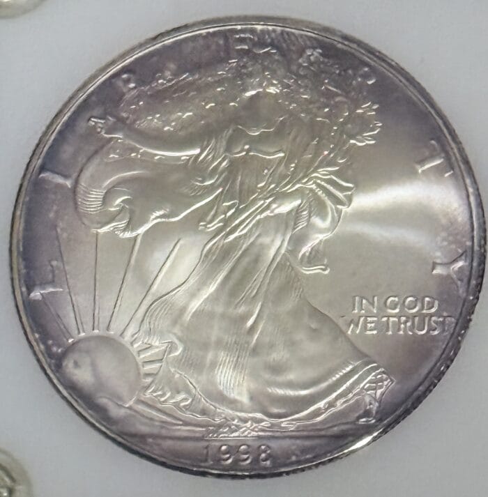 1998 silver dollar coin with Liberty design