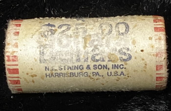 Coin roll labeled $25 from Harrisburg, Pennsylvania.