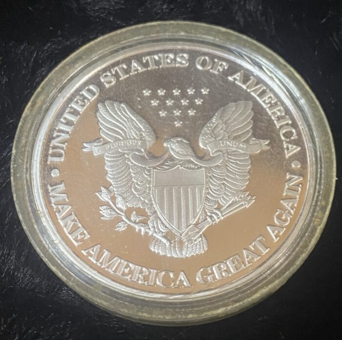 Commemorative coin with eagle and Make America Great Again.