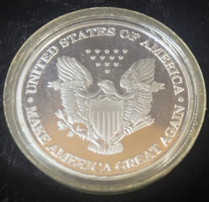 Silver coin with American eagle engraving