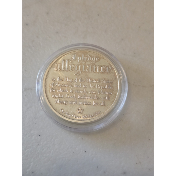 Silver coin with Pledge of Allegiance engraving