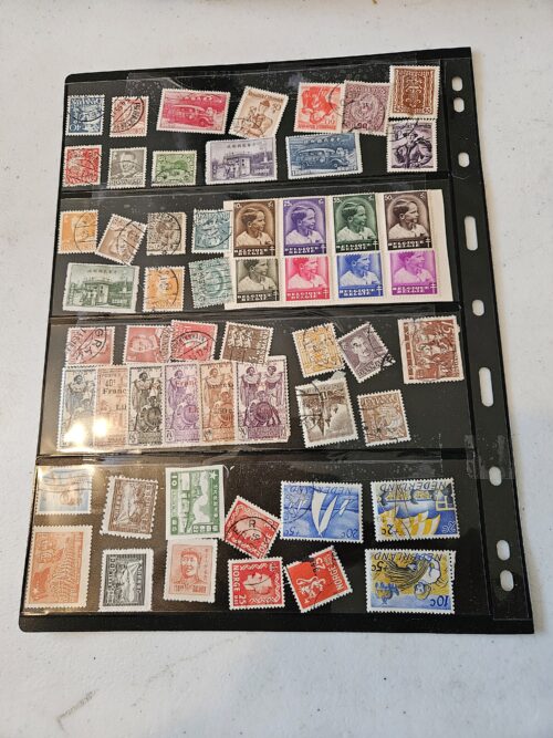 Collection of vintage postage stamps in album