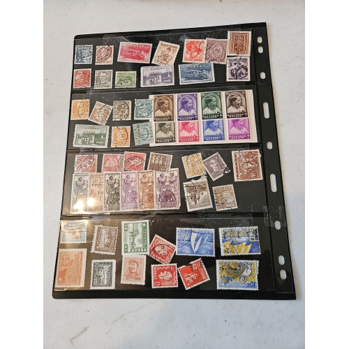 Collection of vintage postage stamps in album
