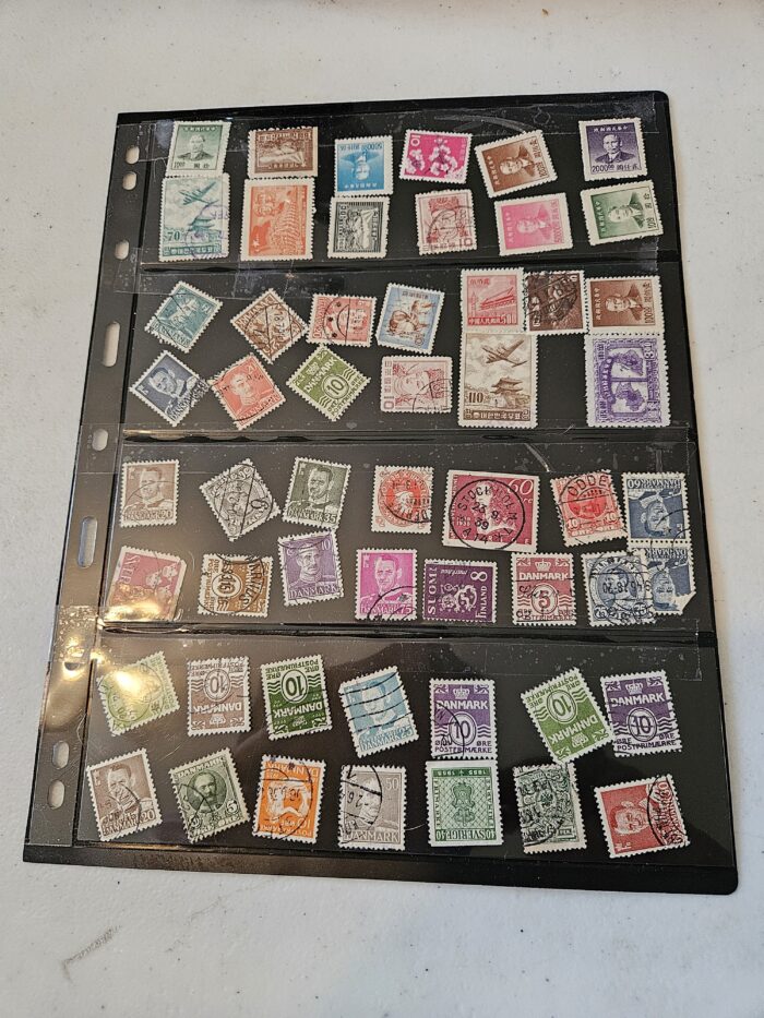 Sheet of assorted vintage postage stamps