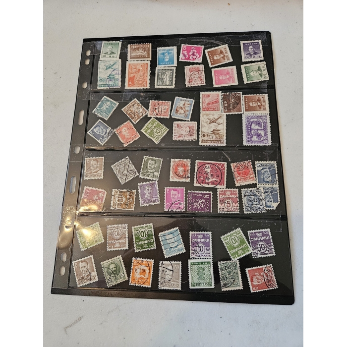Sheet of assorted vintage postage stamps