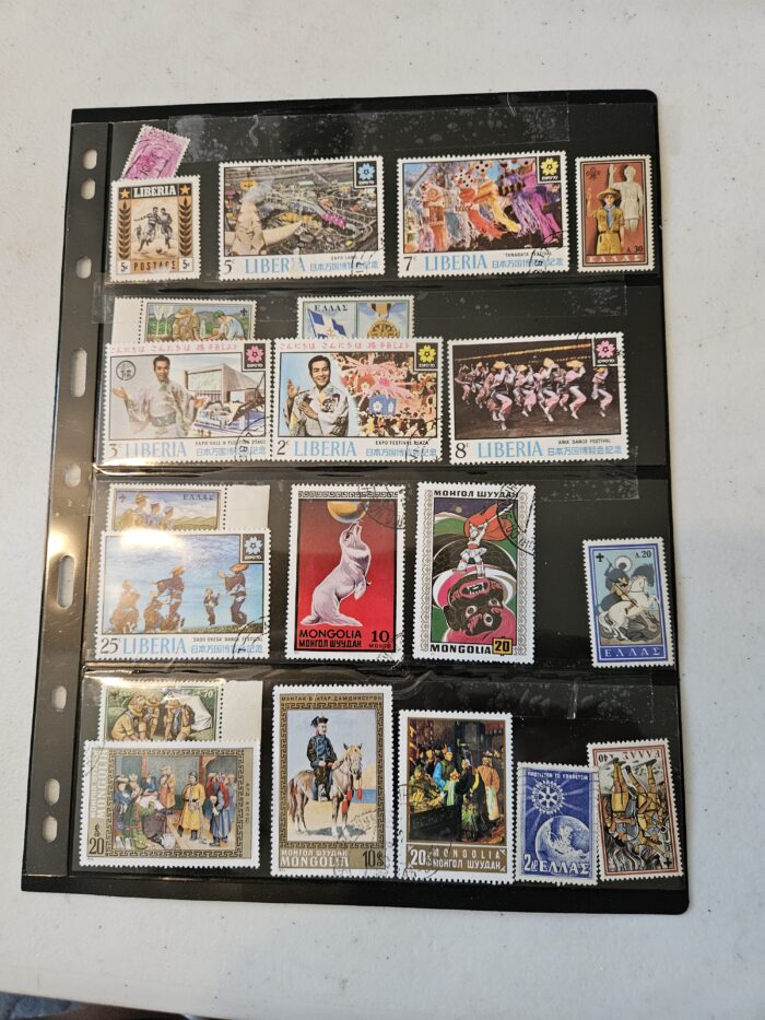 Collection of international postage stamps in an album.