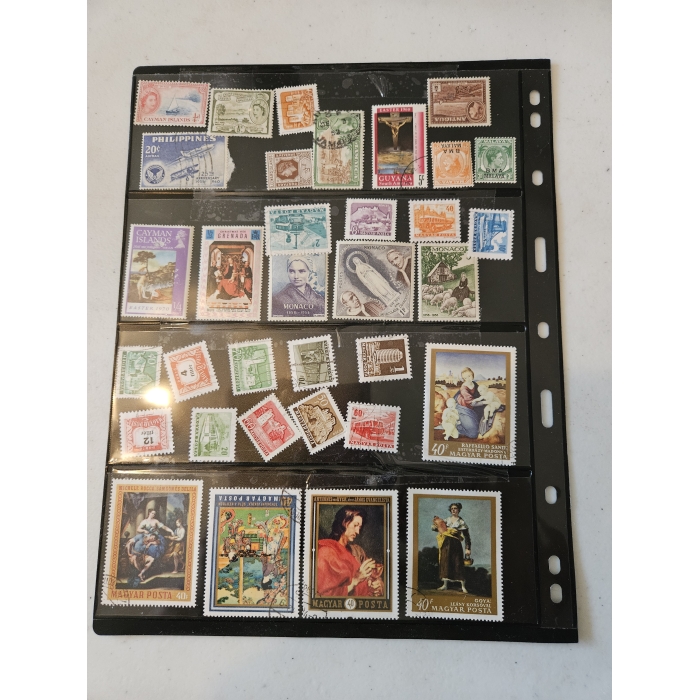Collection of international postage stamps in album.