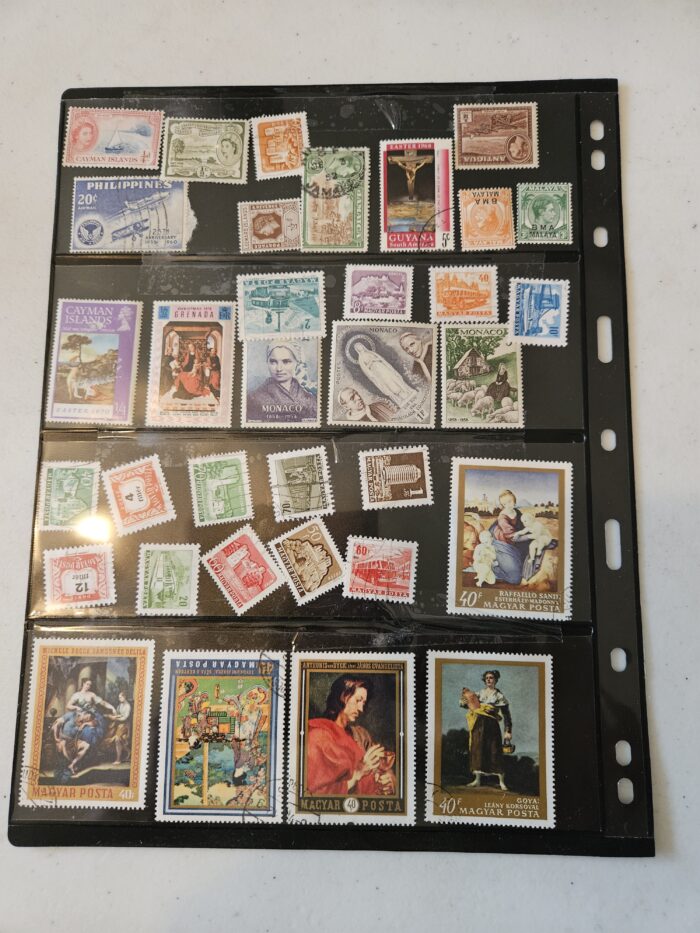 Collection of international postage stamps in album.