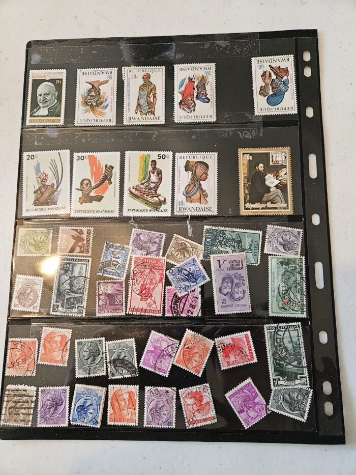 Collection of international postage stamps in an album.