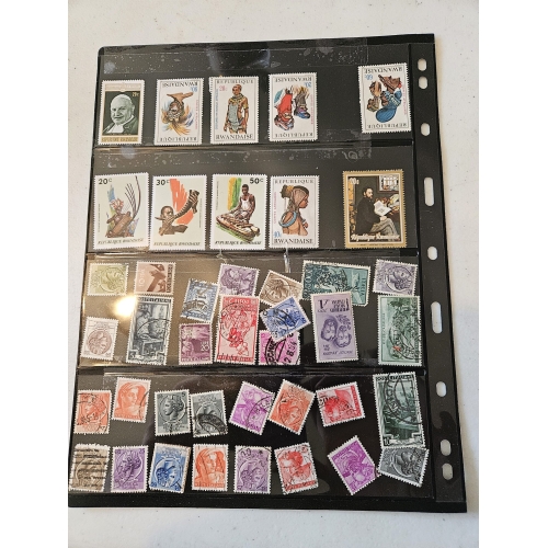 Collection of international postage stamps in an album.
