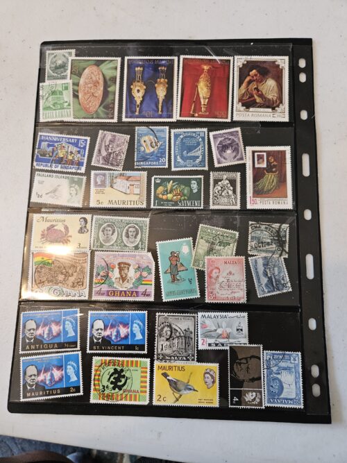 Collection of international postage stamps in an album.