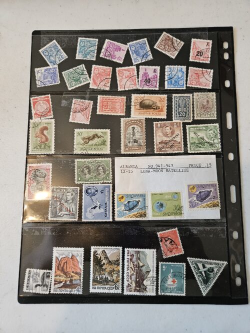 Collection of international vintage postage stamps in binder.