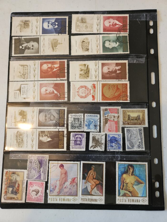 Collection of international postage stamps in an album.