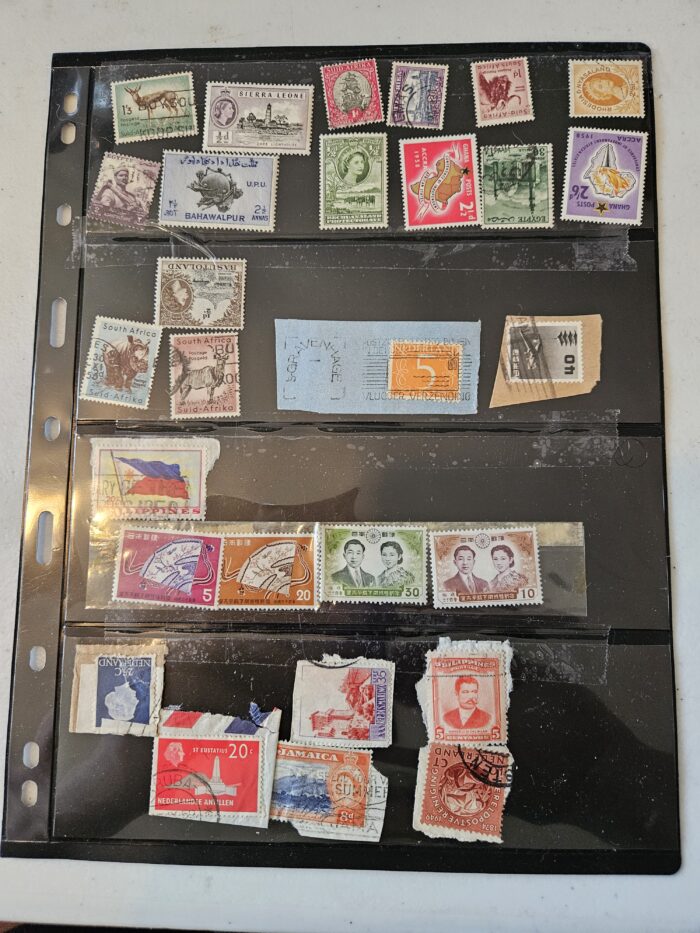 Collection of international postage stamps in album