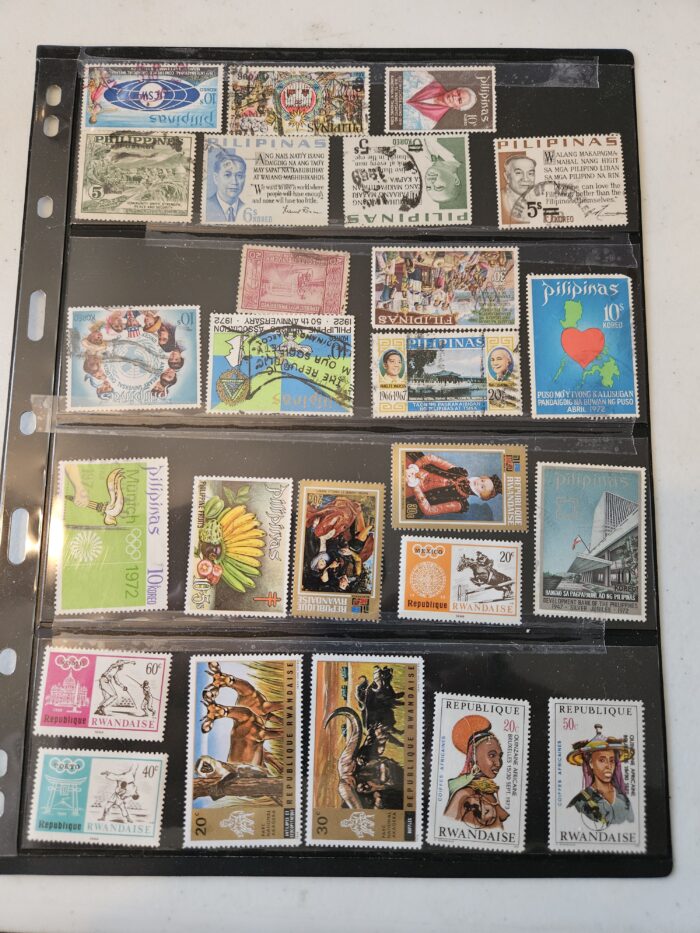 Collection of international postage stamps in album.