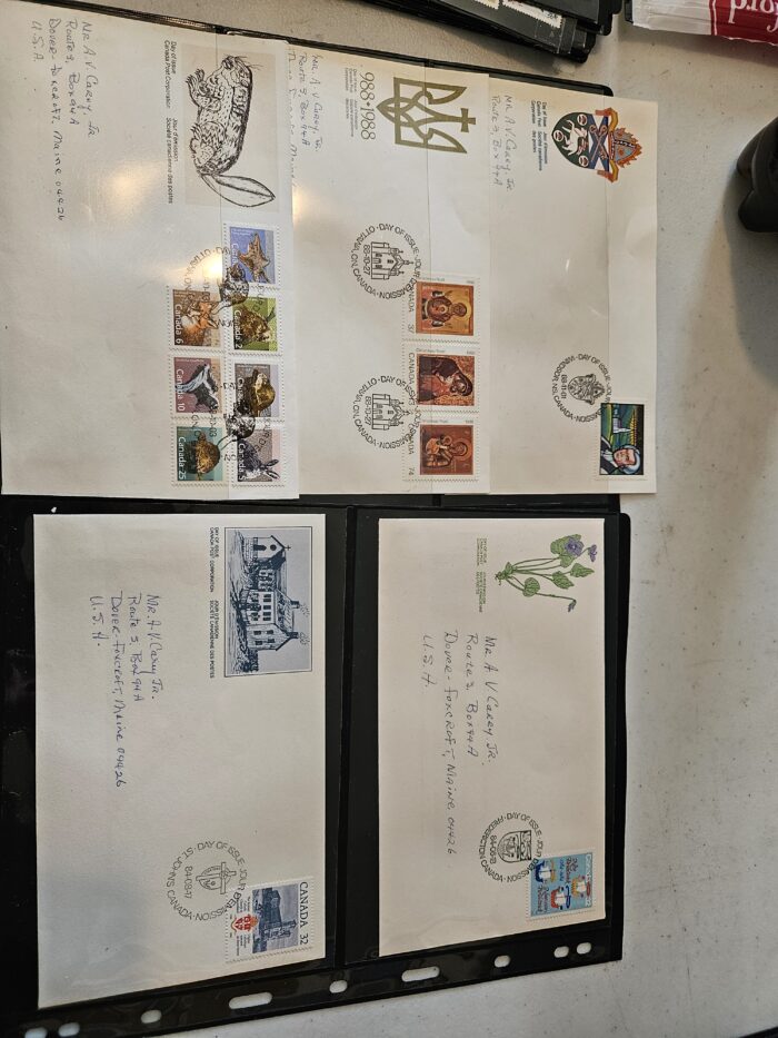 Four envelopes with Canadian stamps and addresses.