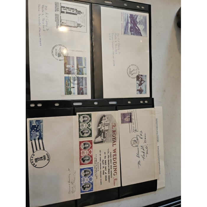 Collection of vintage postage stamps and envelopes.