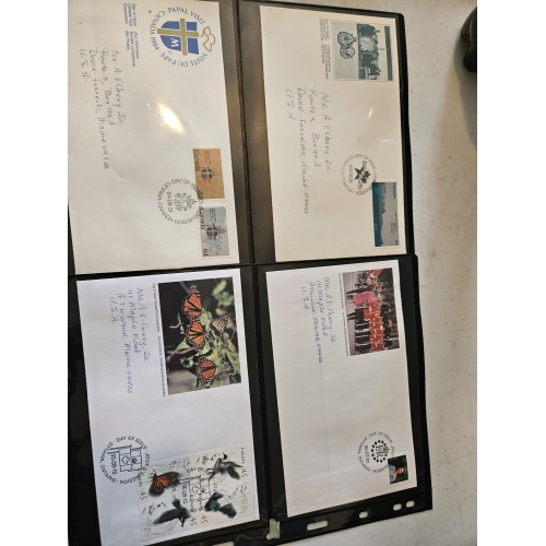 Album of collectible stamped envelopes for collectors.