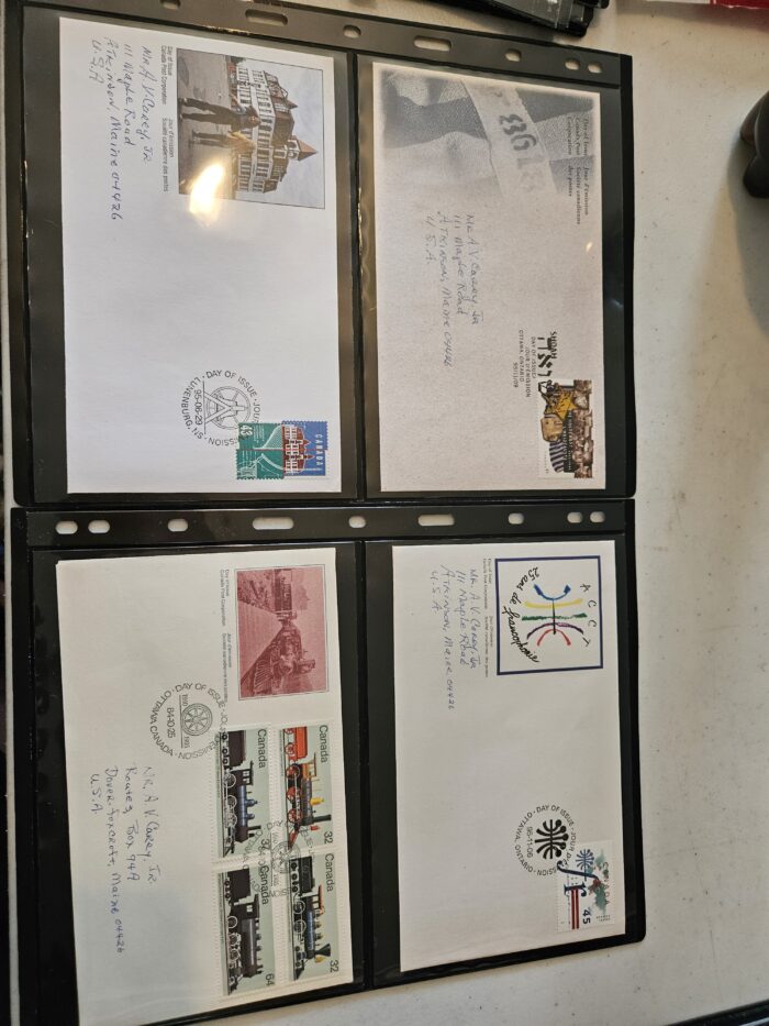 Collection of commemorative envelopes with stamps.