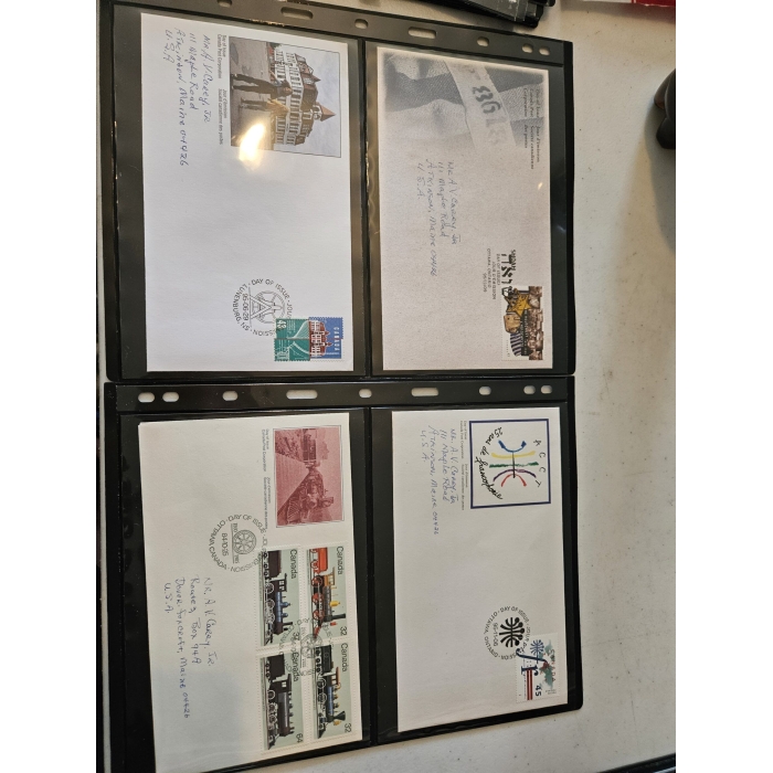 Collection of commemorative envelopes with stamps.