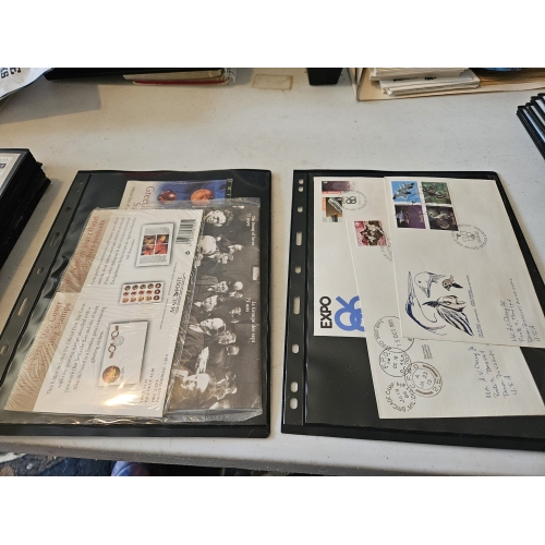 Collection of stamped envelopes in protective sleeves.